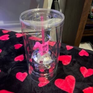 Pink Victoria’s Secret disco ball cup and straw